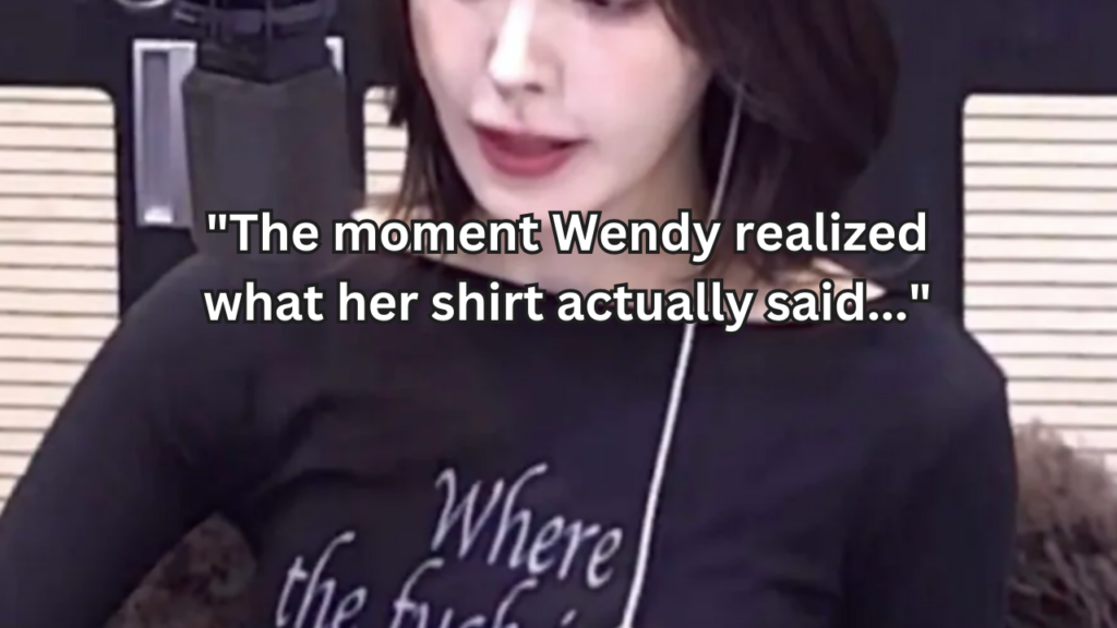 This contain an image of red velvet wendy Young Street the moment she realise what was written in her shirt.